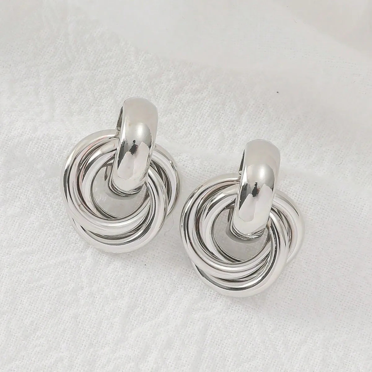 A Pair of Fashionable Bohemian Style Earrings and Jewelry